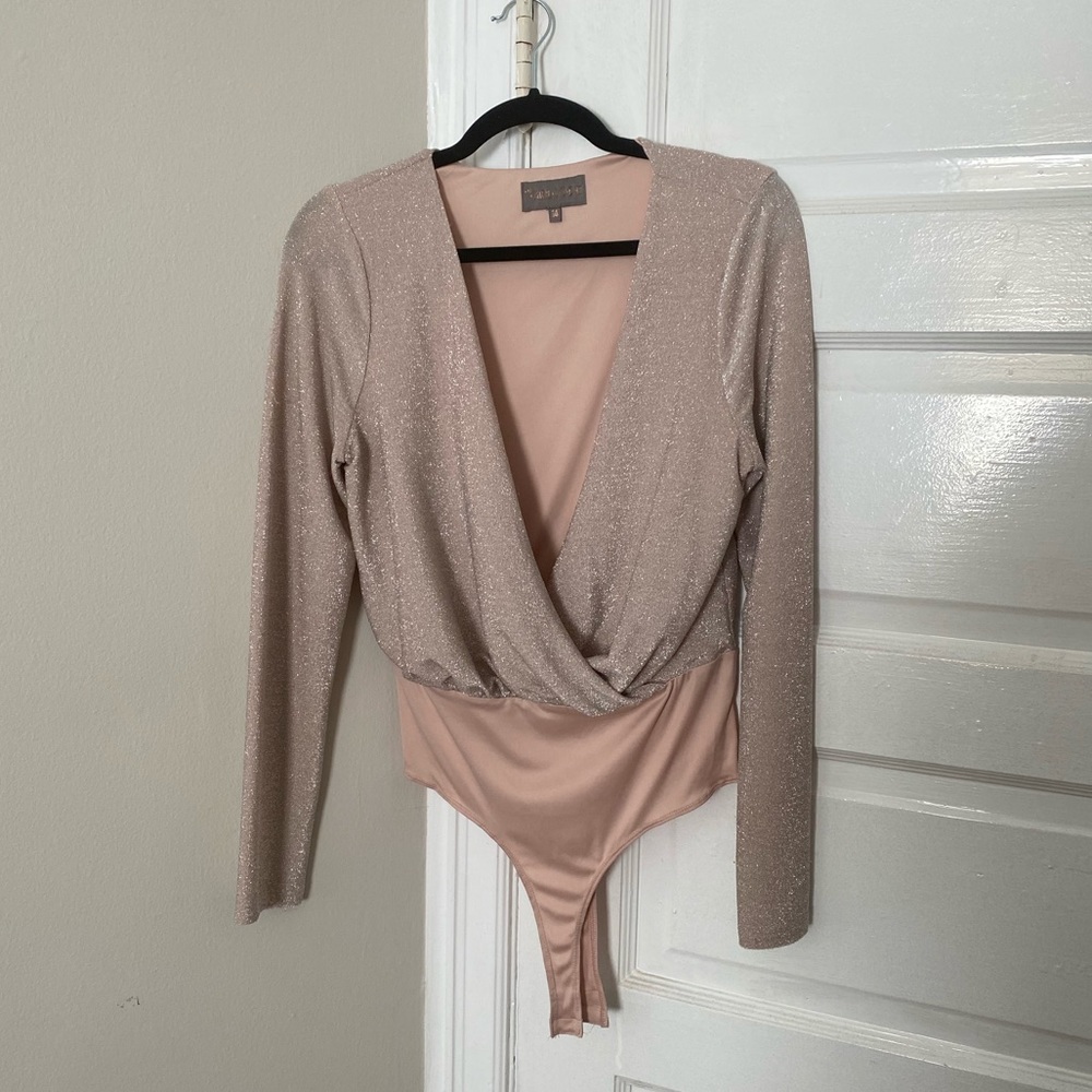 Pink sparkly wrap front bodysuit